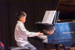 Intermediate student playing F. Chopin - K&M Music School Piano Lessons for Kids and Adults in San Diego