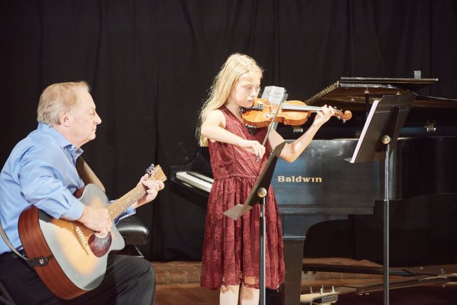 Daughter and dad play duet together - K&M Music School Violin Lessons for Kids in San Diego