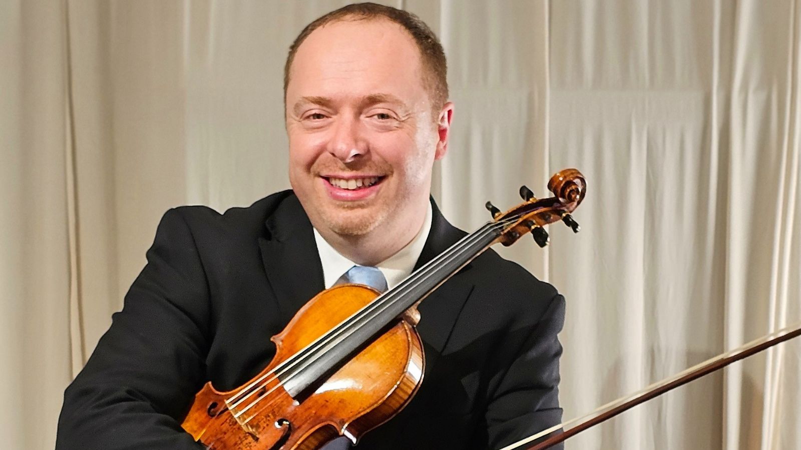 Headshot of Michael Dvoskin, Violin Instructor