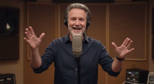 Smiling voice teacher leading a class at K&M Music School