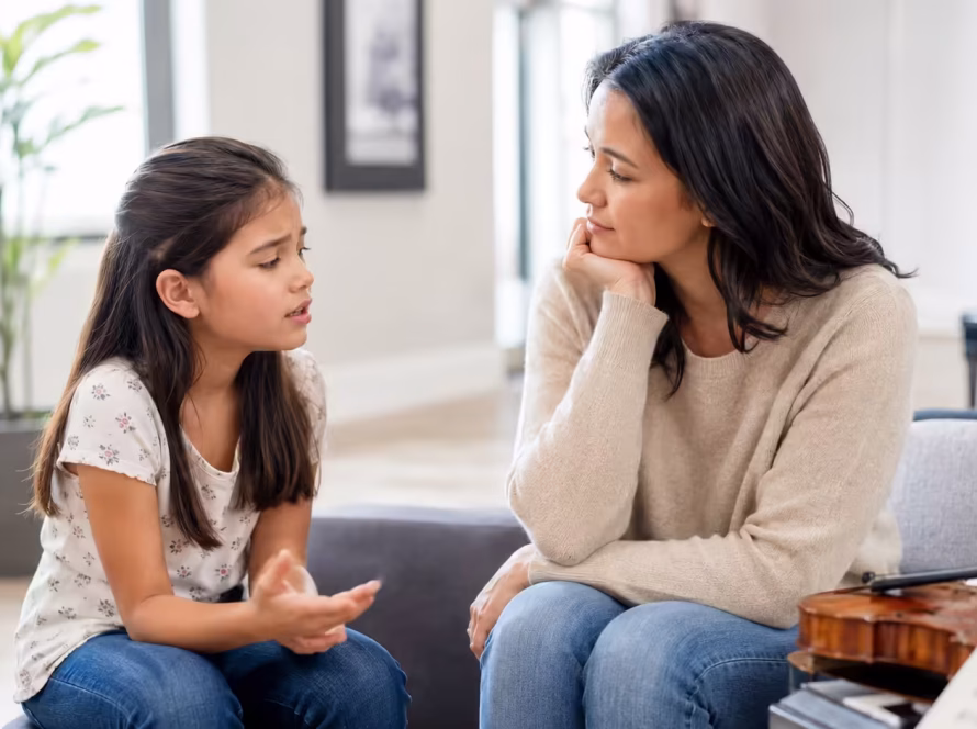 Parent calmly listening to a child talk about wanting to quit music lessons.