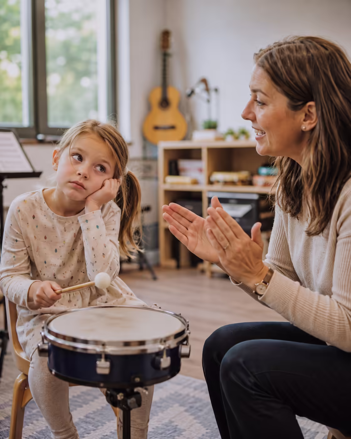Short music lesson for a young child learning drums